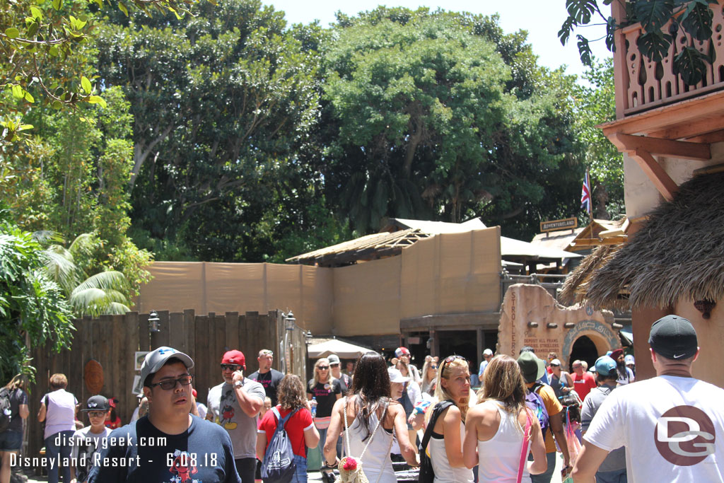 Walls up on the Jungle Cruise queue to block the view of the construction.