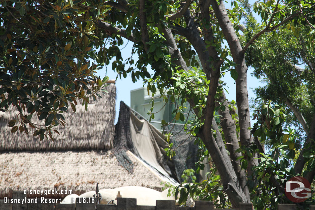 Wonder if this section of roof will receive a full facade or if the temporary  tarps will remain to camouflage it.