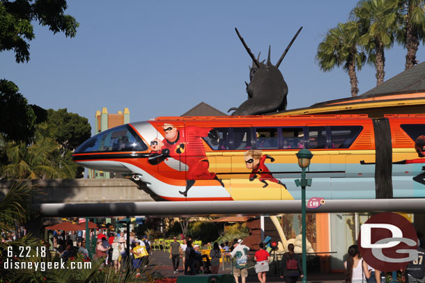 Monorail Orange passing by.