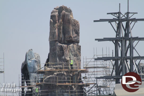 The tallest of the original ones continues to be revealed.  Notice the workers to get a sense of scale of this spire.