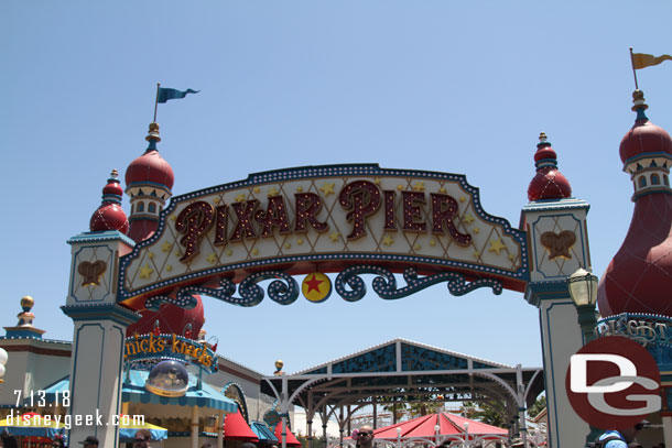 Heading out to Pixar Pier to pick up a FastPass