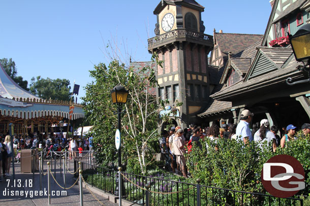 Signs are up for the Play Disney Parks app near Peter Pan.