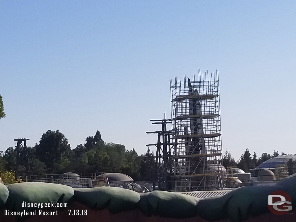 The tops of some of the Black Spire Outpost buildings are visible and more spires are rising above the village.