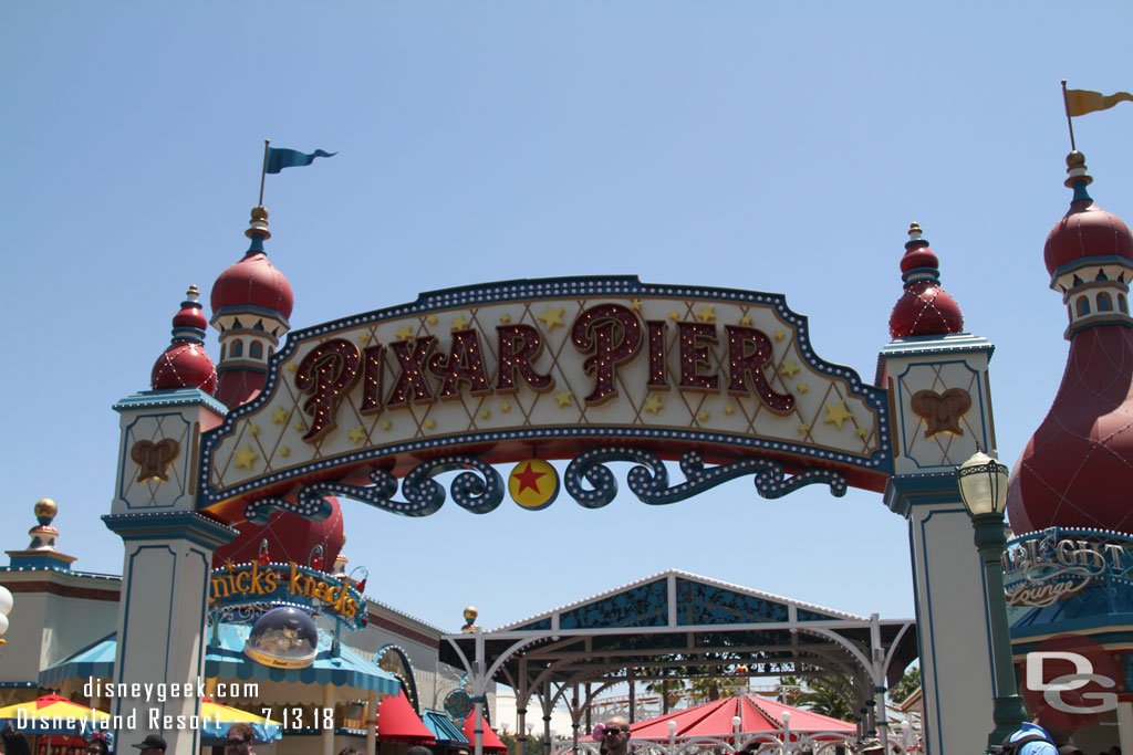 Heading out to Pixar Pier to pick up a FastPass