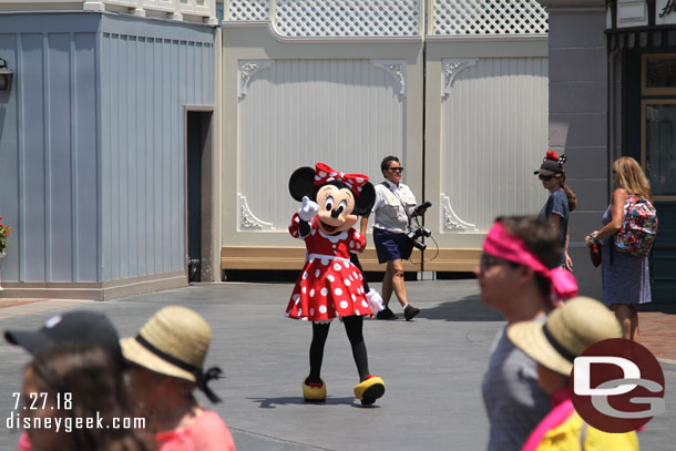 Minnie Mouse out for a stroll in Town Square.