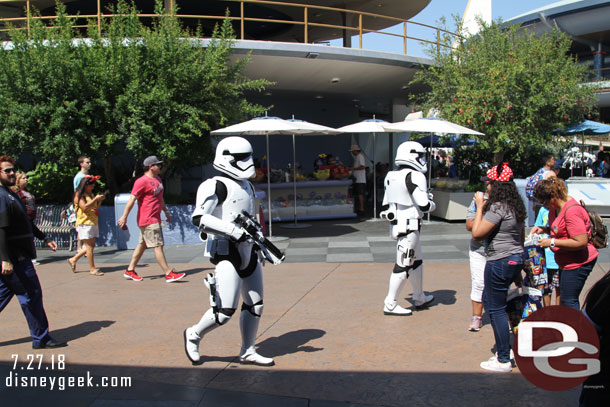 A patrol roaming Tomorrowland.