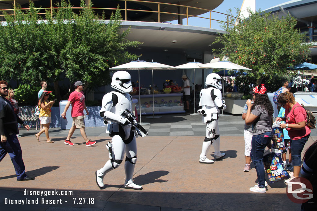 A patrol roaming Tomorrowland.