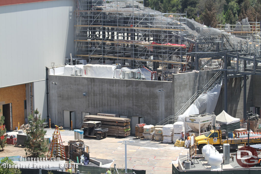 Supplies for concrete work have been brought in.  Also note the boards covering the surface.  Was concrete poured last week? Or are they on top of the rock bed?