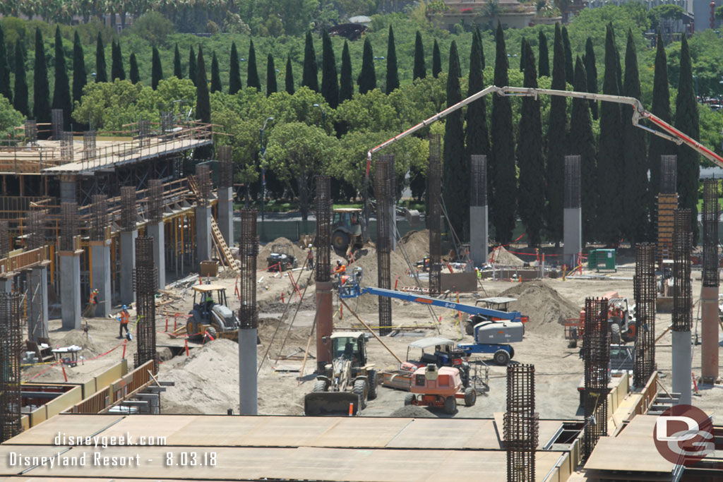 Concrete being poured.. appears to be foundation work but a little hard to tell from this distance/angle.