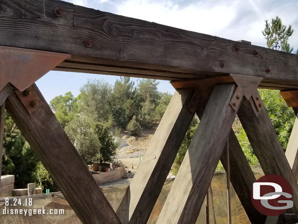 From the train a quick glimpse of the walkway to Black Spire Outpost taking shape.