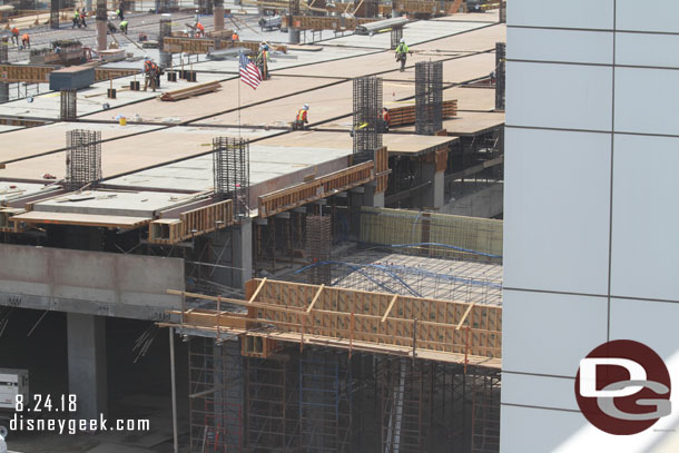 It appears there will be bridges for both pedestrians and cars at the front and back of the structure on each level.  Here is the 2nd floor one taking shape.