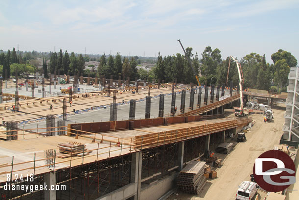 Here you can see the forms for the second ramp in the foreground.  In the background a truck pumping concrete for the 2nd floor.