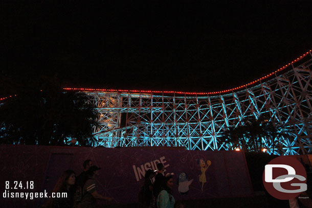 The Inside Out attraction site at night.