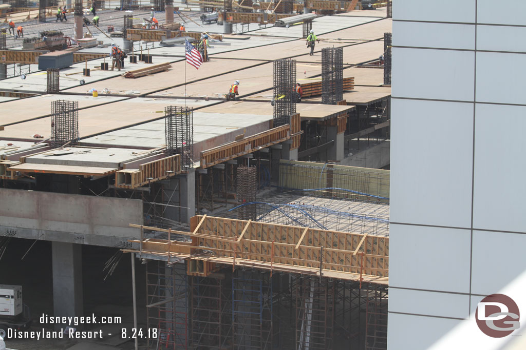 It appears there will be bridges for both pedestrians and cars at the front and back of the structure on each level.  Here is the 2nd floor one taking shape.