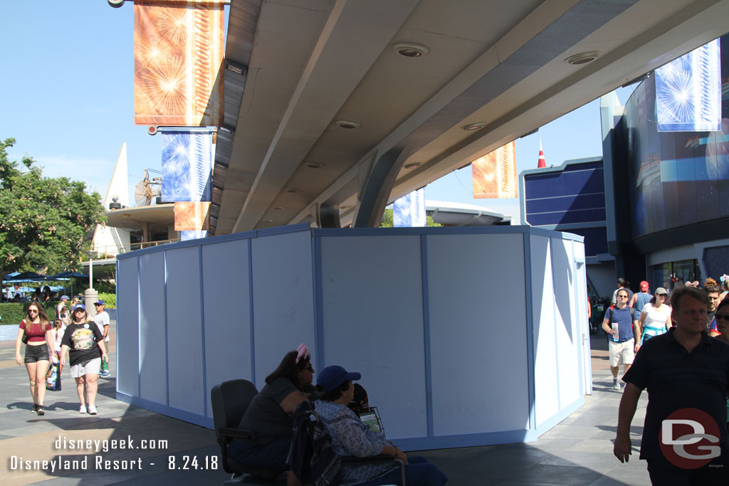 Work going on in Tomorrowland.  Assuming they are removing the seating and reducing the footprint of the support column to open the walkway more.