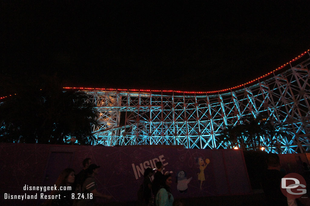 The Inside Out attraction site at night.