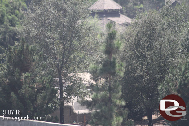 The blue tarps are gone as you look toward Critter Country.  Guess that means the rock work in that area is done to a point they no longer need to protect the trees.