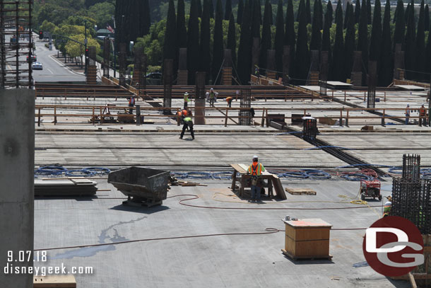 Looking toward Magic Way you can see various stages of completion on the different floors.  Nearest is the third floor and out in the distance you can see supports going up for the 2nd floor.