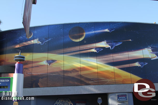 The mural on the north side of Tomorrowland is back.