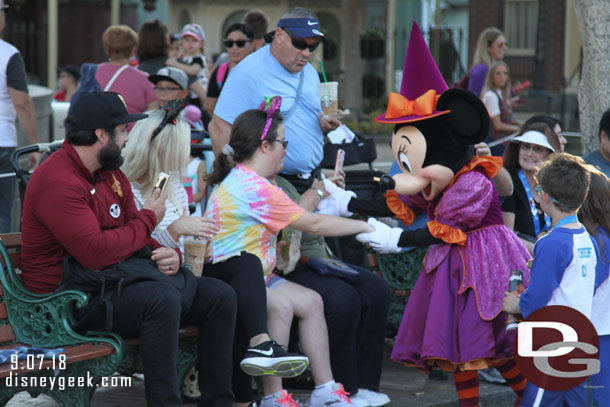 Minnie Mouse was walking the parade route greeting guests (Pluto was too).