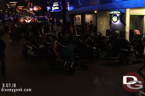 Stroller parking.. notice the line and how a majority are outside the designated area.  Cast Members showed up and started to move them all into the area.