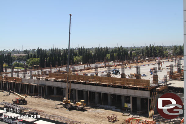 Moving over to the garage the third level looks to have about a 1/4th of it poured now.  Work continues on the second level and third level as the structure expands toward Magic Way and up.