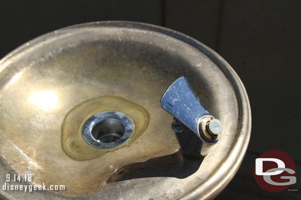 The drinking fountain that finally returned to Paradise Park is broken.. the button and drain.