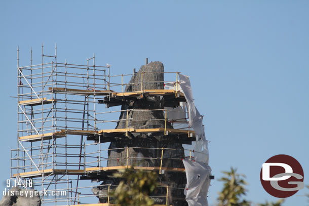 Looks like they are starting to apply concrete to this spire with the plastic up to help with over spray.