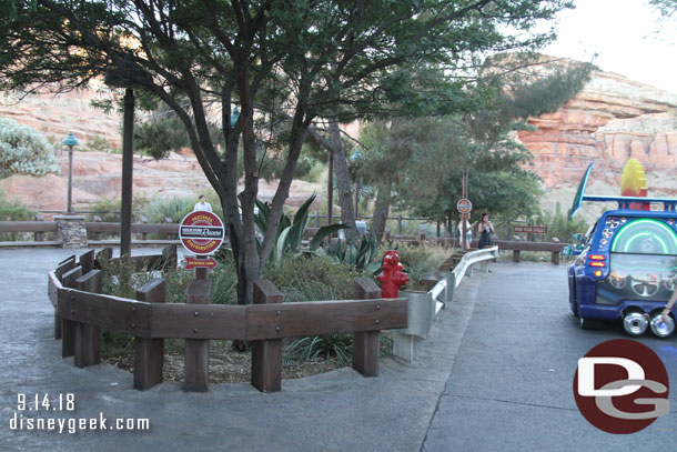 Signs for the Radiator Springs Racers Fast Pass distribution that happens here.  FastPasses for the attraction are still gone early in the day most days.