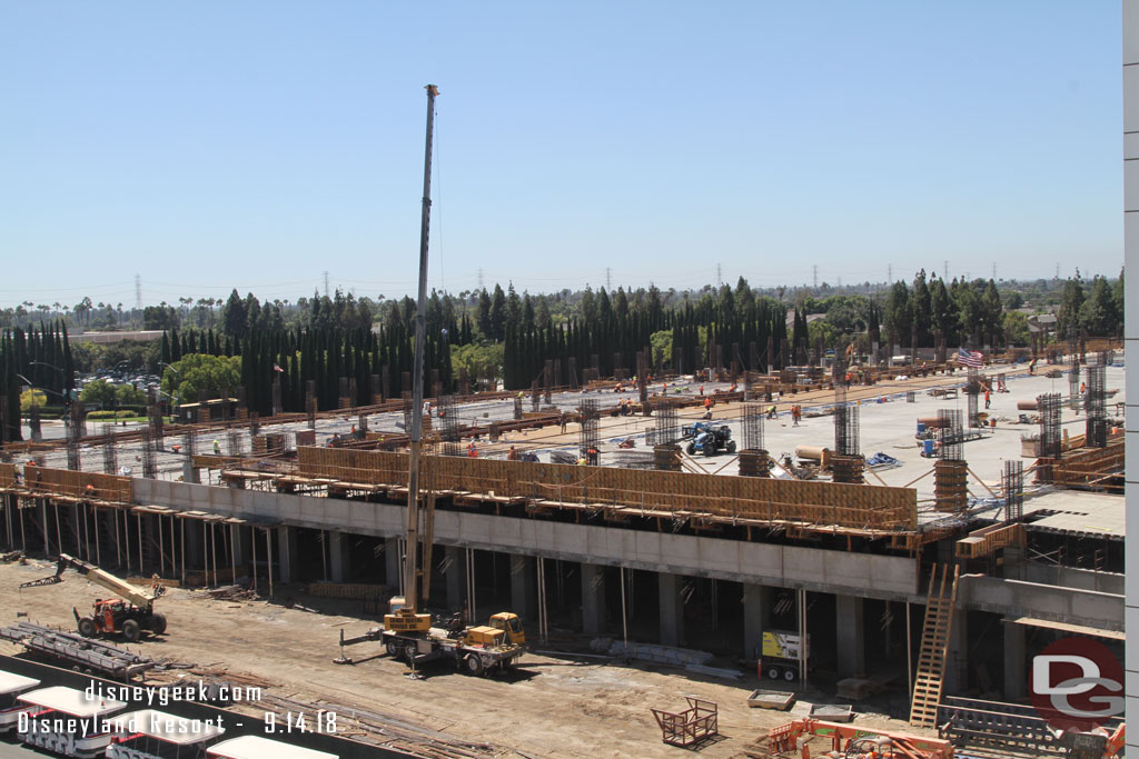 Moving over to the garage the third level looks to have about a 1/4th of it poured now.  Work continues on the second level and third level as the structure expands toward Magic Way and up.