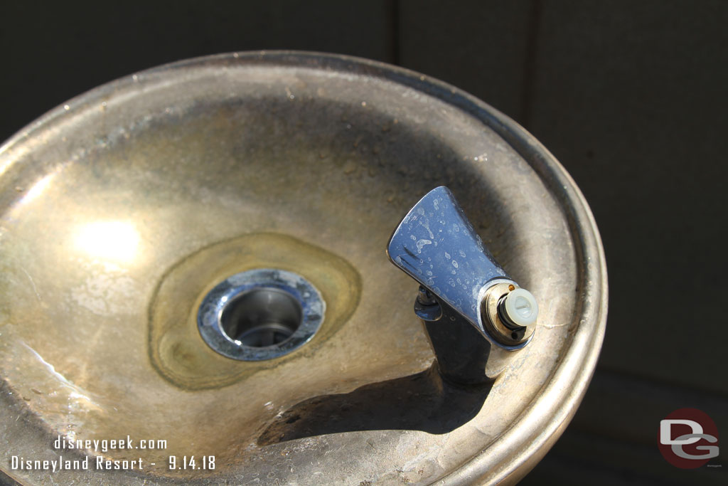 The drinking fountain that finally returned to Paradise Park is broken.. the button and drain.