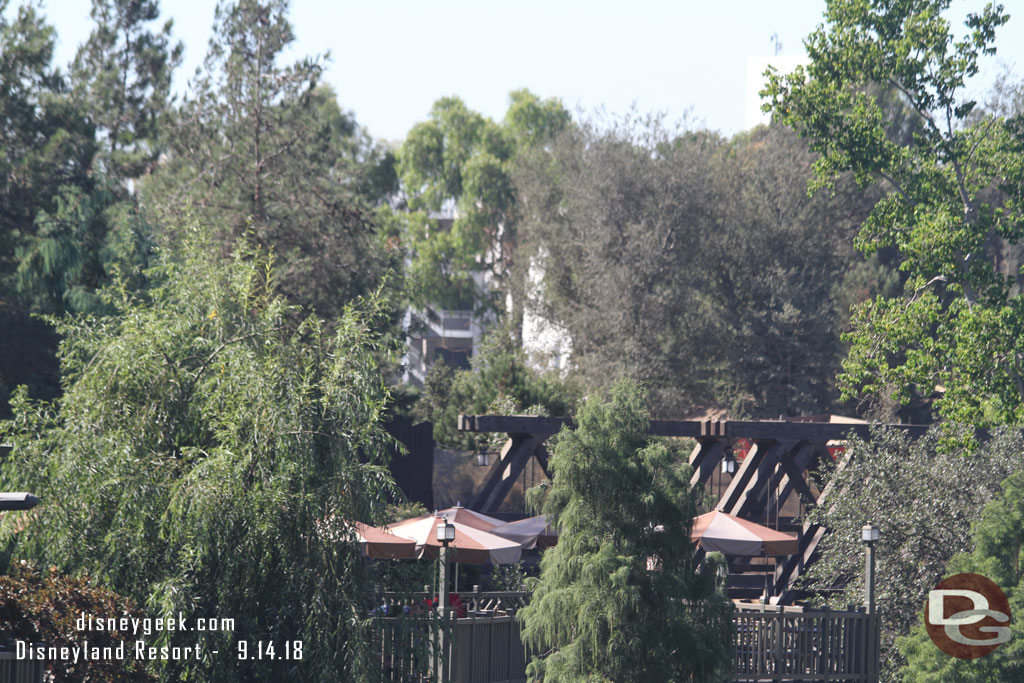 You can still see the Mickey and Friends structure through the trees, but it is slowly disappearing.