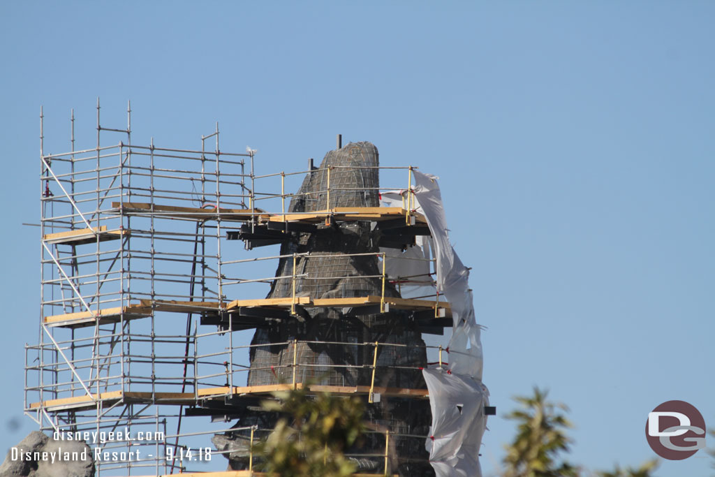 Looks like they are starting to apply concrete to this spire with the plastic up to help with over spray.