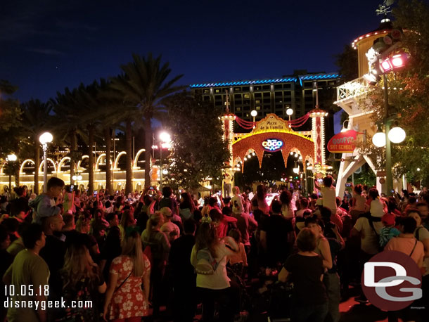 7:10pm a good size crowd trying to see the final Musical Celebration of Coco performance.