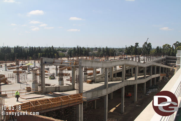 All the temporary supports are removed from the original portions of the two ramps.  The lower ramp is being connected to the 4th floor and the upper one looks like it will go to the roof span/bridge.