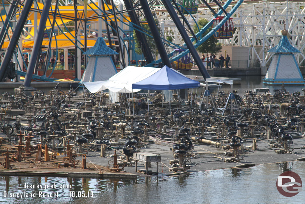 The new lines are coiled by the fountains but not installed yet on the center platform.