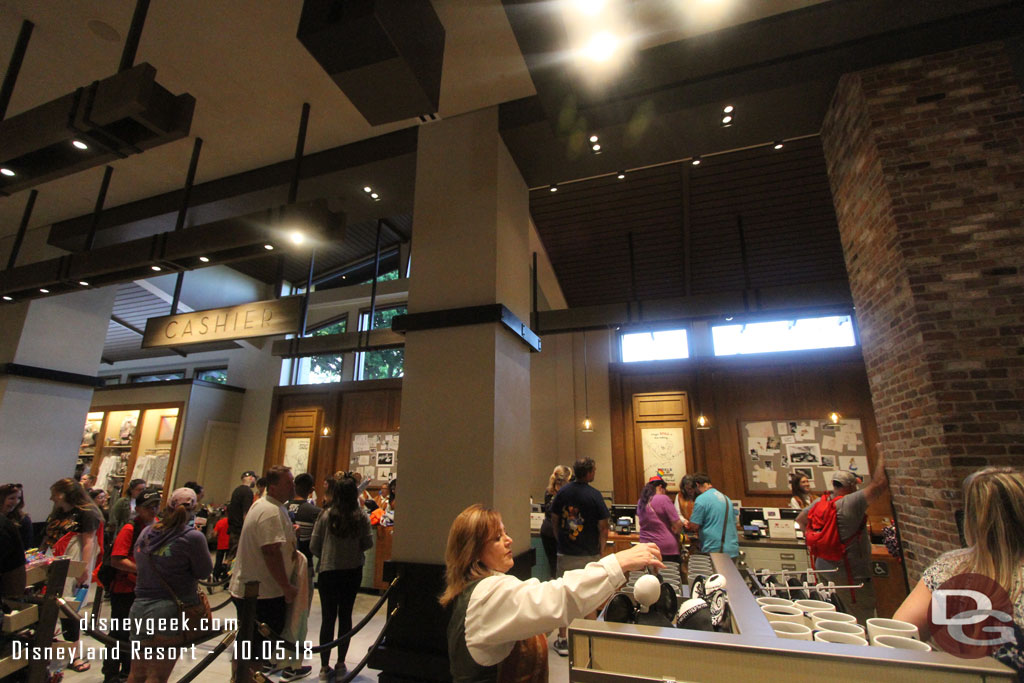 Cashiers are in the center of the section on the side nearest the trams.