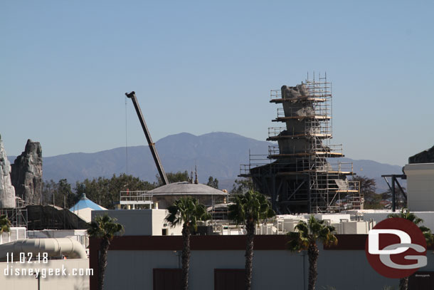 It looks like some of the scaffolding is down from the dome structure in the middle.  And the rock on the right is progressing.