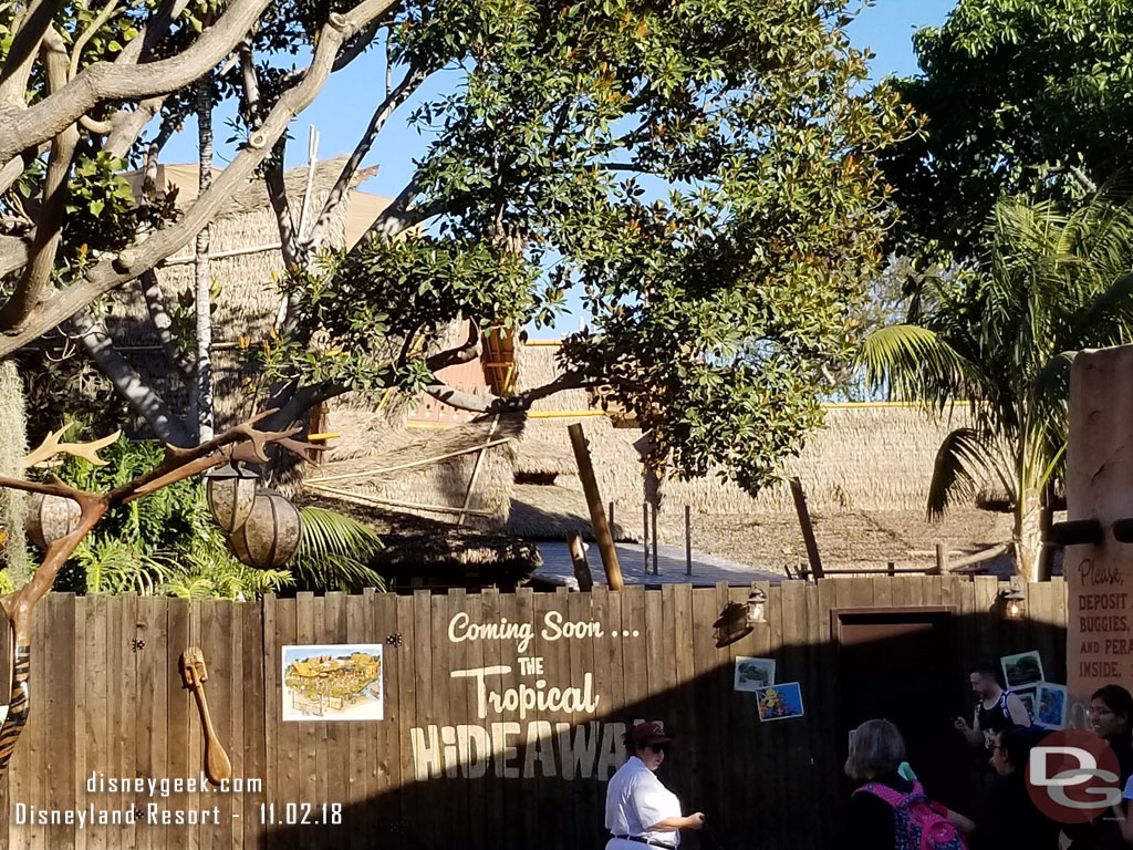 Support posts for the Tropical Hideaway cover are rising above the walls as it moves toward completion.