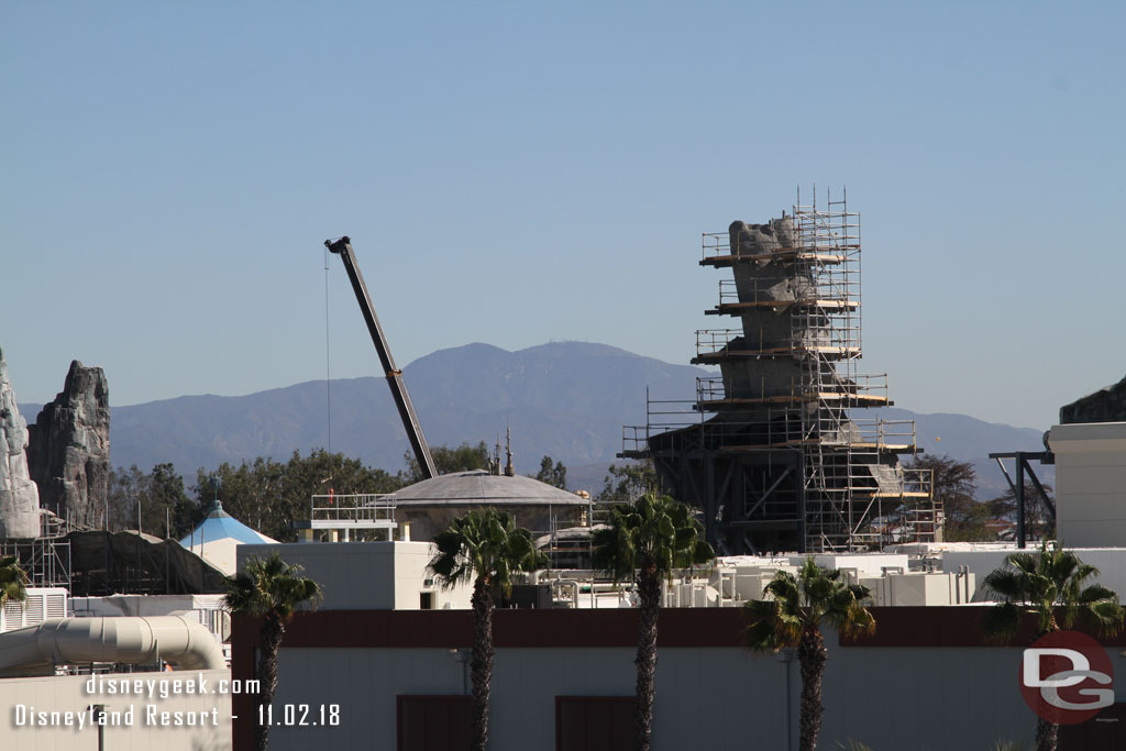 It looks like some of the scaffolding is down from the dome structure in the middle.  And the rock on the right is progressing.