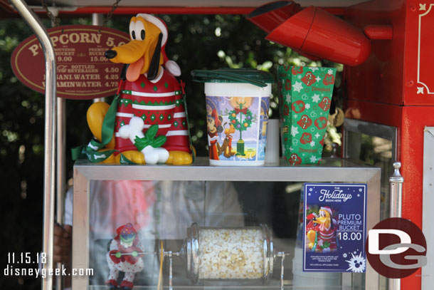 Pluto popcorn buckets are back and he has a red sweater this year.