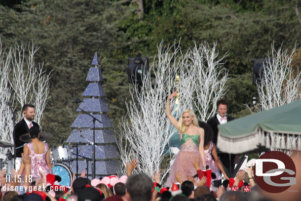 She went up to the stage and waved then went back down for another take at the arrival.