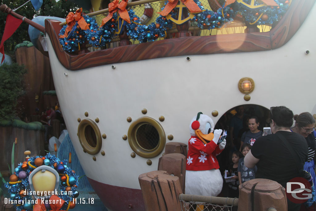 Donald greeting guests in front of his boat.