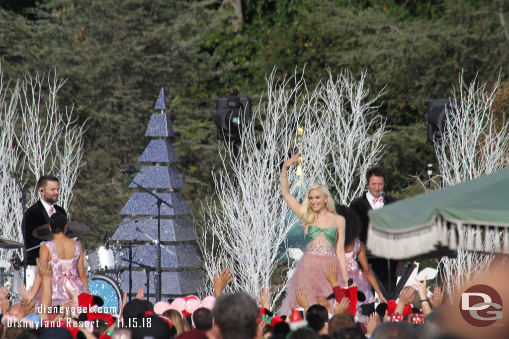 She went up to the stage and waved then went back down for another take at the arrival.