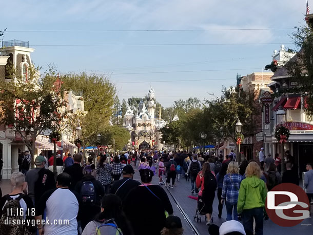 Making my way up Main Street, 5 minutes until park opening.  Notice the support cables for the garland were installed last night now that the taping is over.