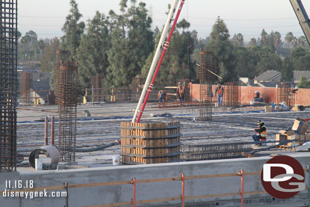 Here teams are preparing the area in the foreground.  In the background a team is working on the next segment.