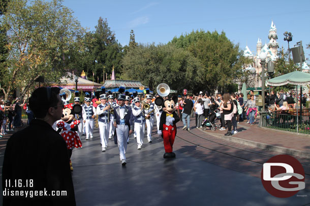 Mickey, Minnie, the Disneyland Band & Friends marching to Town Square.