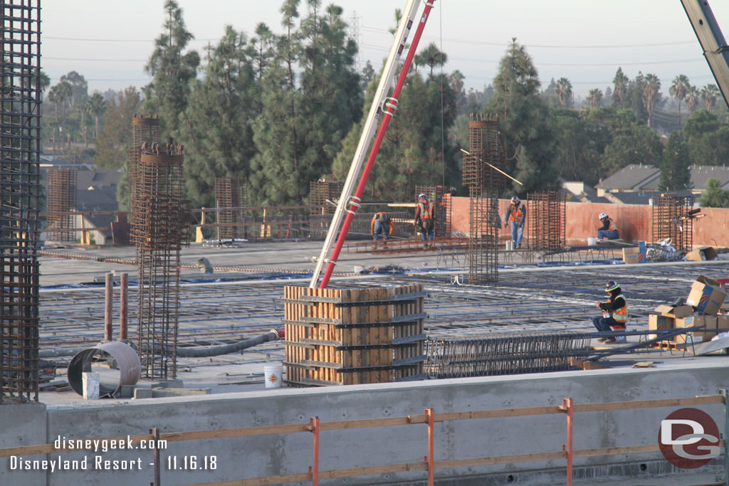 Here teams are preparing the area in the foreground.  In the background a team is working on the next segment.