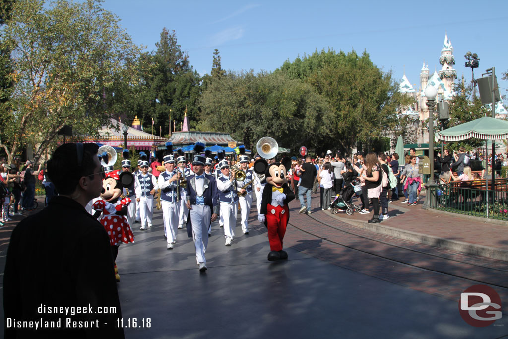 Mickey, Minnie, the Disneyland Band & Friends marching to Town Square.