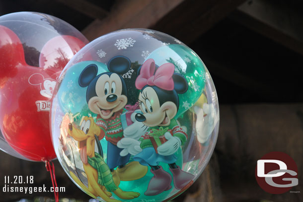 And Mickey, Minnie and Pluto on the other side of the holiday balloon.